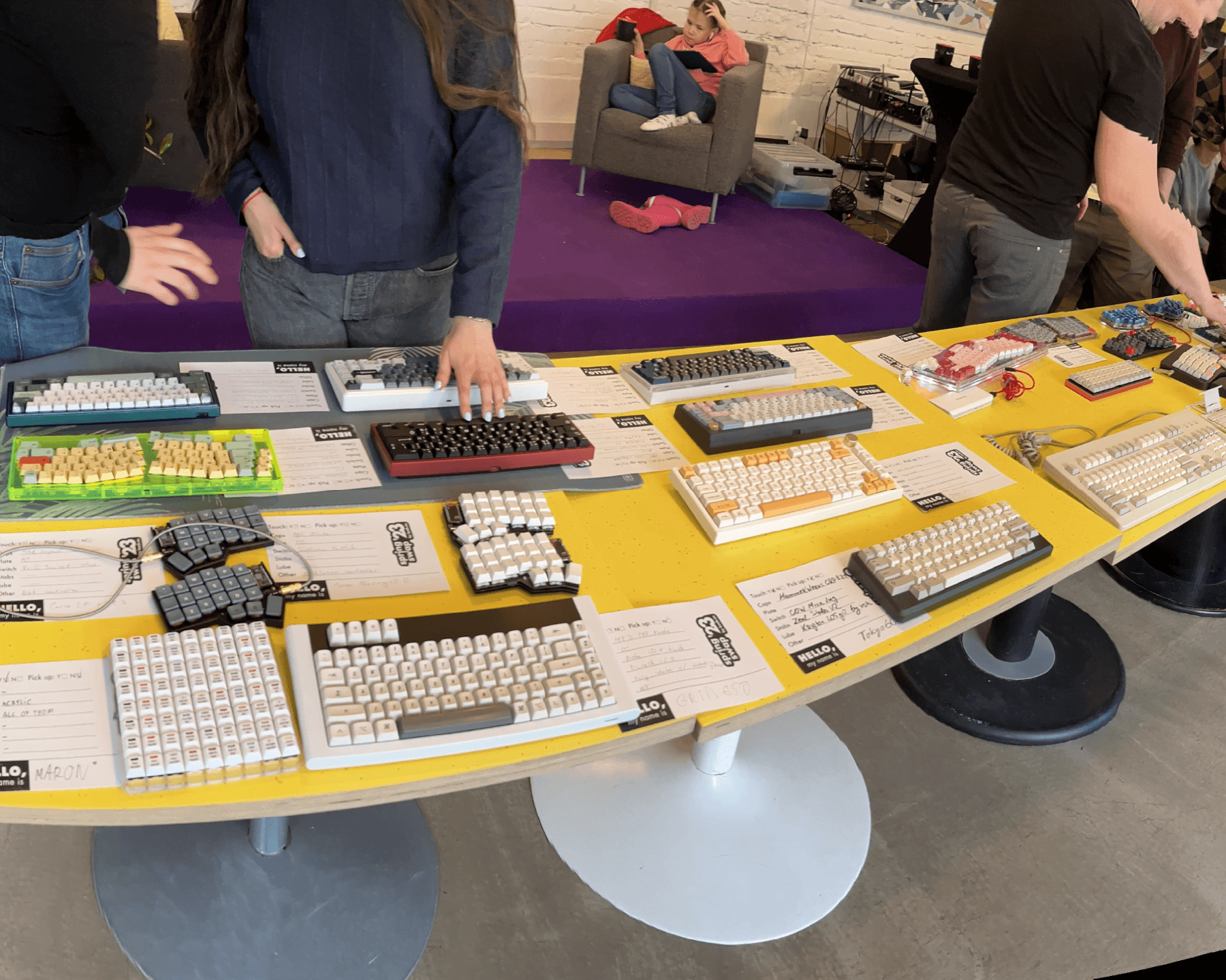 From our third meetup, people looking at keyboards