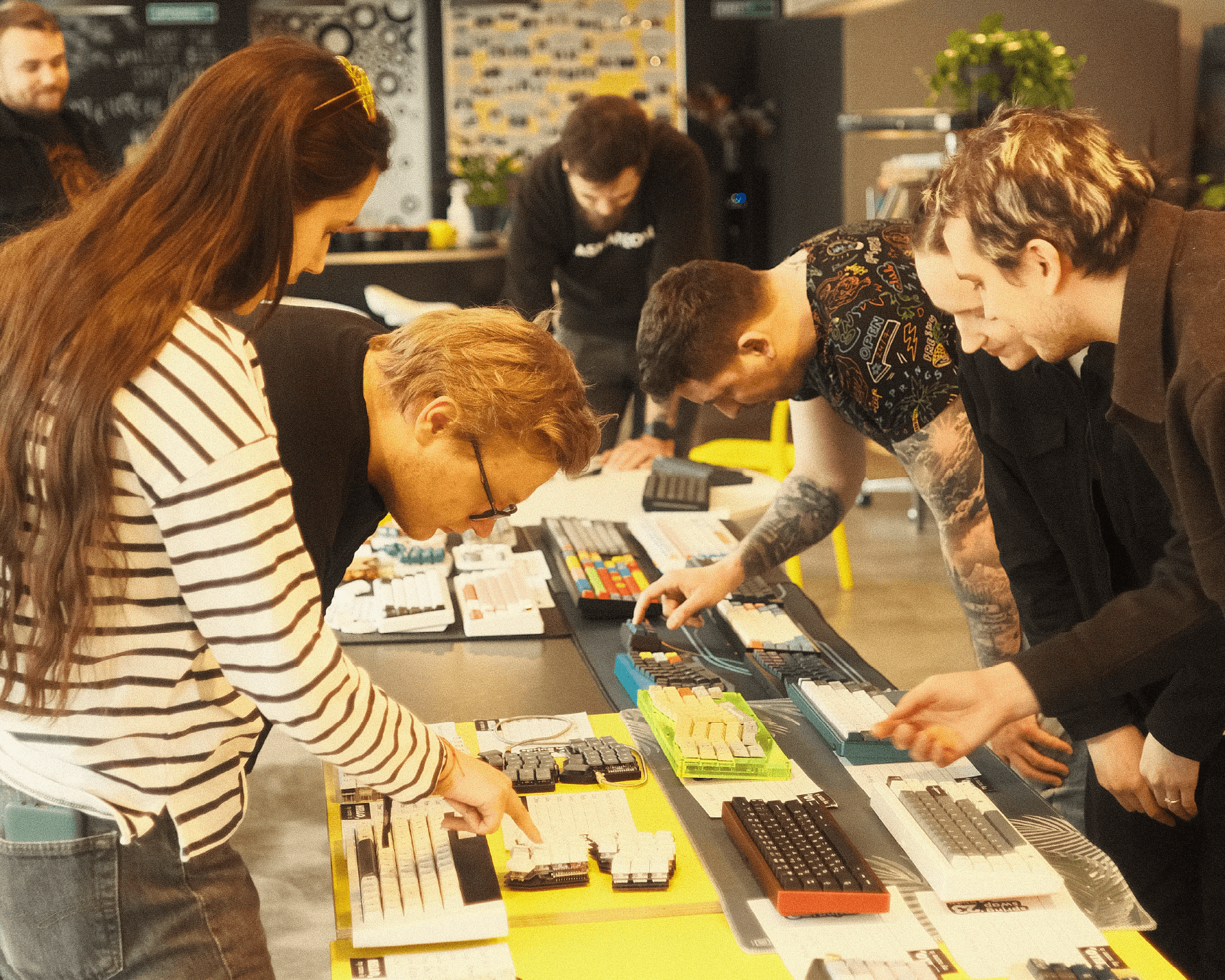 From our third meetup, people looking at keyboards